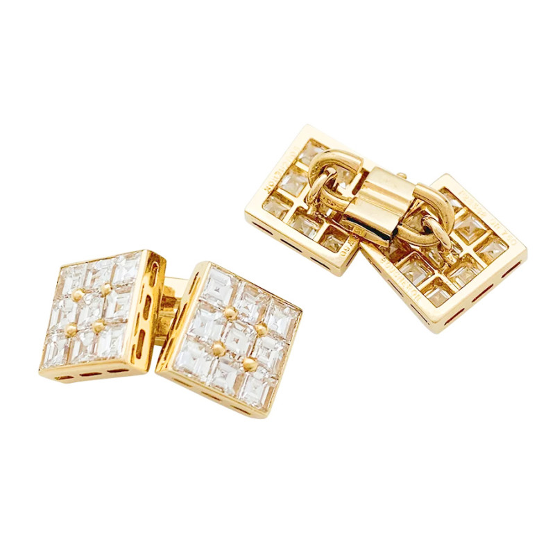 Boucheron cufflinks set with square-cut diamonds.